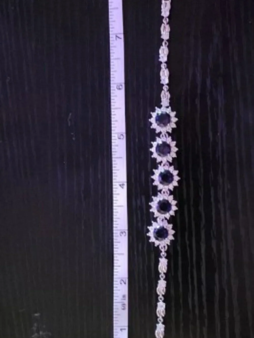 Silver Bracelet with Purple Gemstone Flower Accents